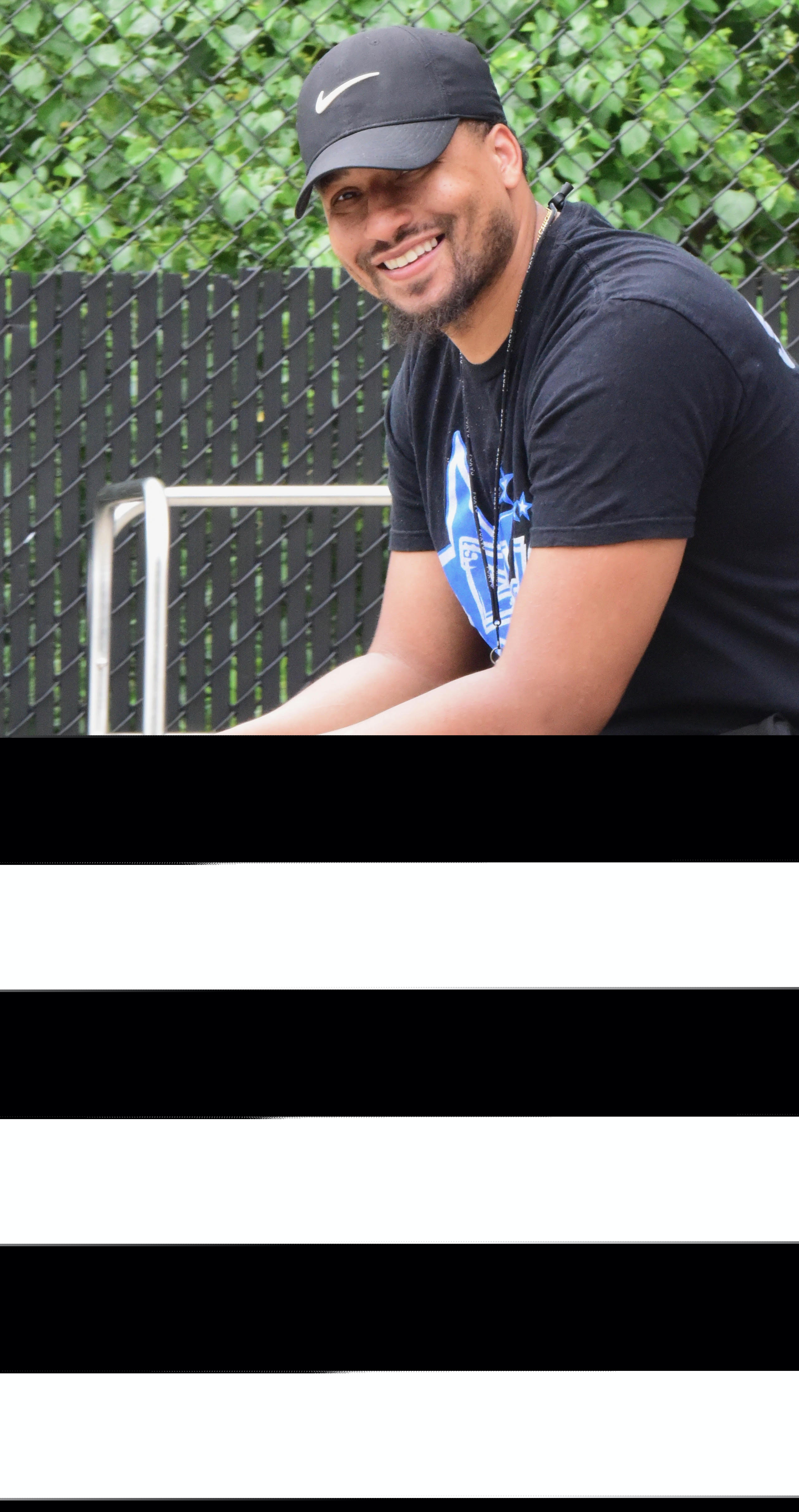 ELW coach smiling at summer camp